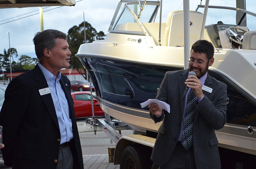 Frank Maggio presents the Insignia Award to Ted Roberts, A New Approach to Financial Planning.