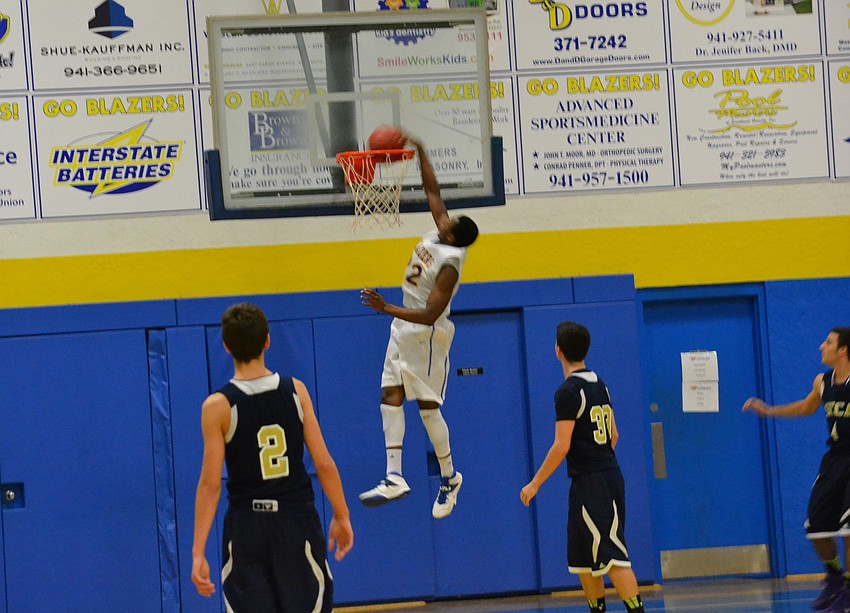 Brion Whitley goes up for a dunk in the fourth quarter.