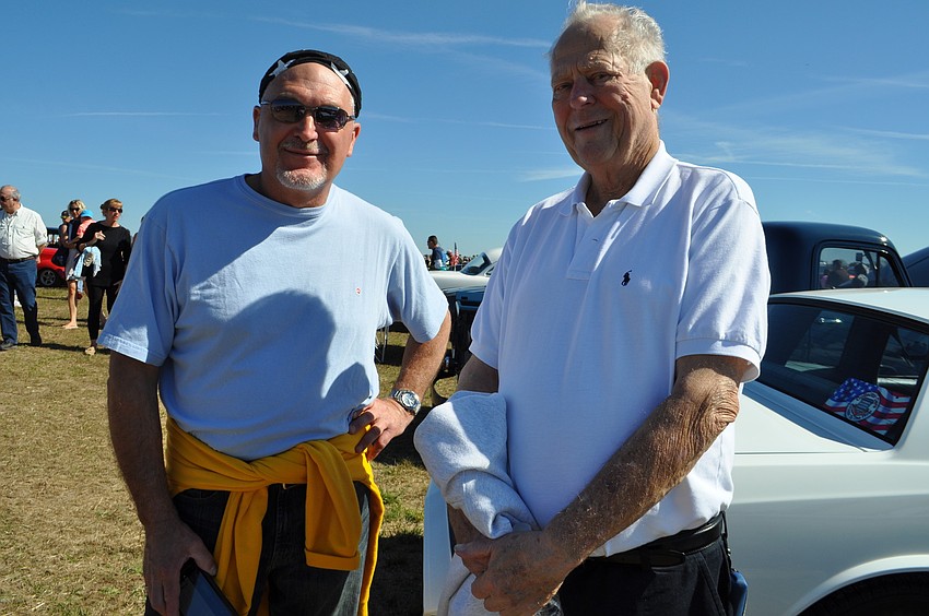 Chris Rhoads and Doug Wynn look for their favorites â€” 1932 or 1934 Roasters and 1957 Chevrolets.