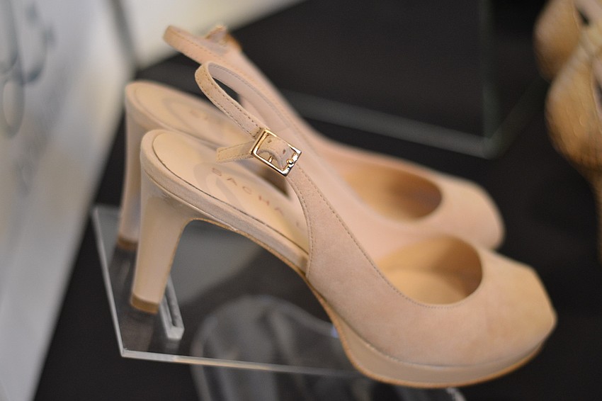 Clothing and shoes for the occasion were fashioned by L Boutique.