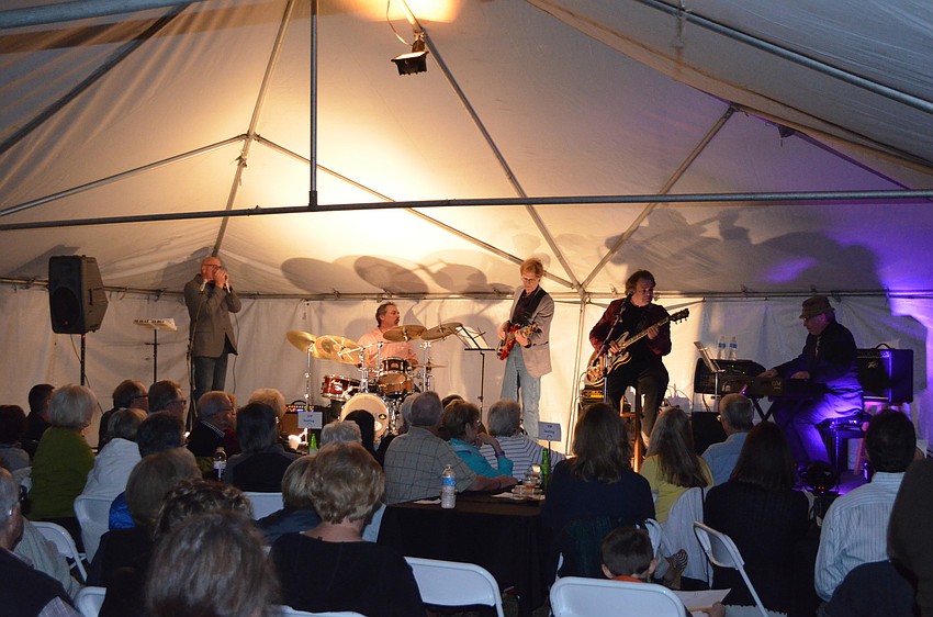 Harmonica player Tony Smith, drummer Rick Andre, bassist Michael Dempsey, singer and lead guitarist Steve Arvey and jazz blues pianist Bill Buchman