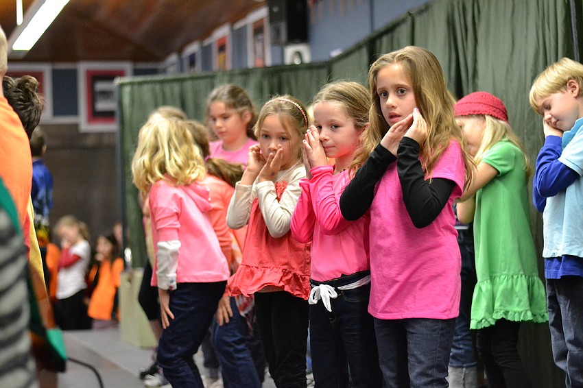 Students perform songs and scenes recollecting the history of Out-of-Door Academy.