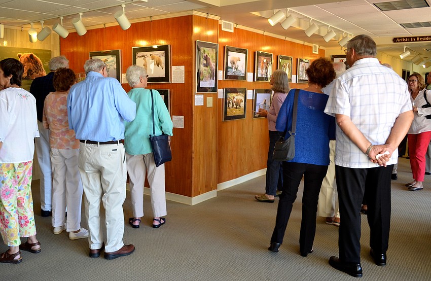 The gallery was full for Newmanâ€™s exhibit opening.