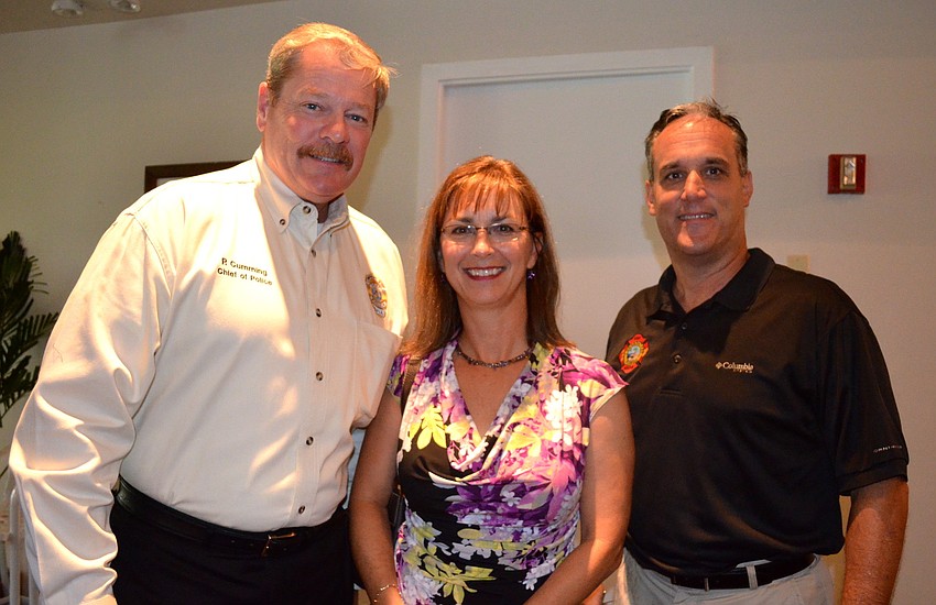 Police Chief Peter Cumming, Kathi Pletzke, town of Longboat Key, and Fire Chief Paul Dezzi