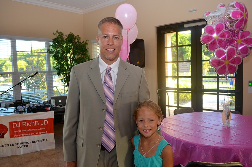David and Morgan Foth get ready to dance.