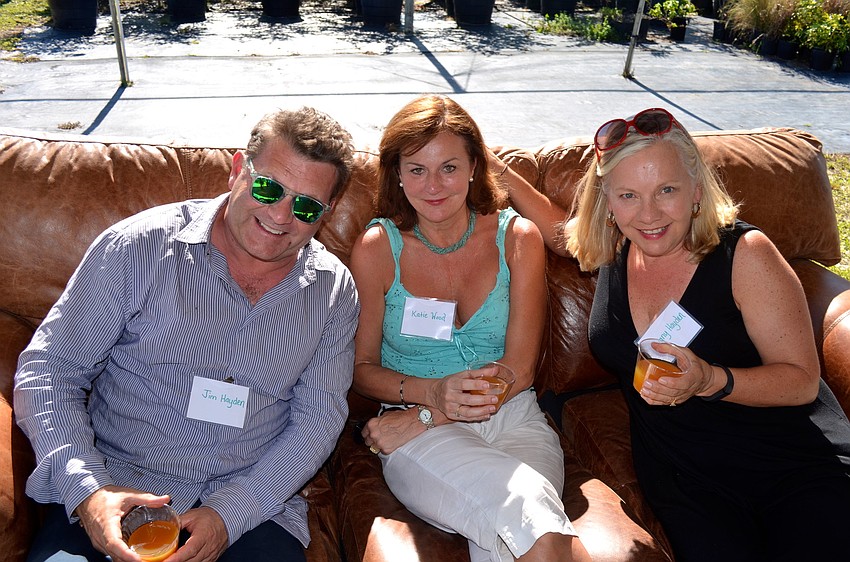 Jim Hayden, Katie Wood and Signy Hayden enjoy peach mint tea.