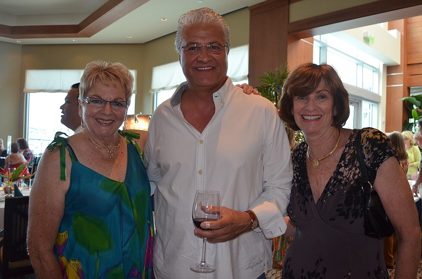 Carmen Ramsey with Dave McKay of 99.5 Tampa and Kiwanis Club President Carolyn Kofler