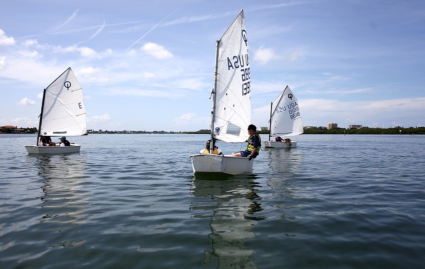 Although the wind wasnâ€™t strong, the campers begin their journey to a sandbar off Bird Key.