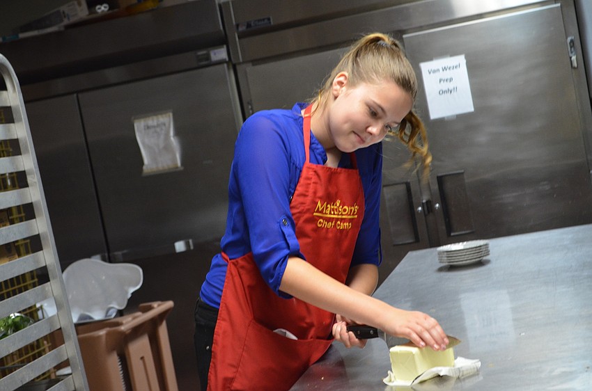 Sara McCurry plates butter for the parentâ€™s tables