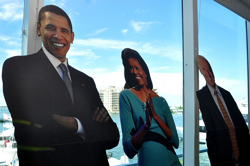 Barack and Michelle Obama and Joe Biden cutouts were used as dÃ©cor at the Democratic Club of Sarasota luncheon.