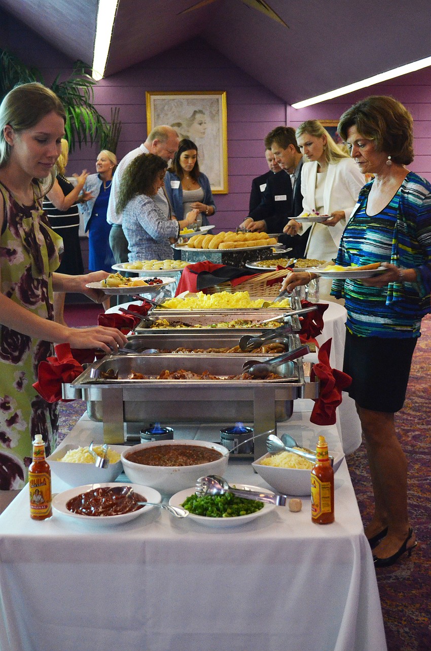 Attendees were served breakfast before a presentation.