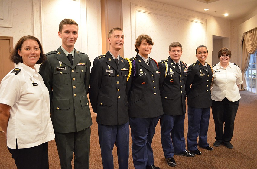 Col. Christina Bowman with Sarasota Military Academy cadets, Matthew Chapman, Hayden Wilde, Katie Smith, T. J. Moretti, Lauren Medred and Maj. Rachel Wasserman.