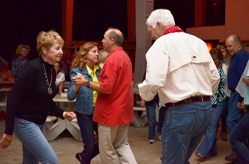 Geri and Mark Scott do their best dosey do.
