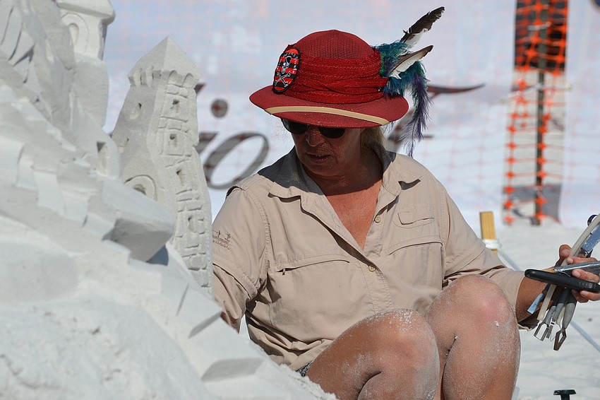 Christy McDonald Atkinson works on winding steps for an unnamed sculpture for the Crystal Classic.