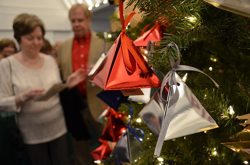 Guests could purchase tickets that allowed them to select a box from the tree with a mystery prize ranging from bottles of wine to cash prizes.
