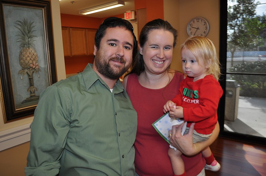 Mike, April and Audrey Barrett enjoy the morning.