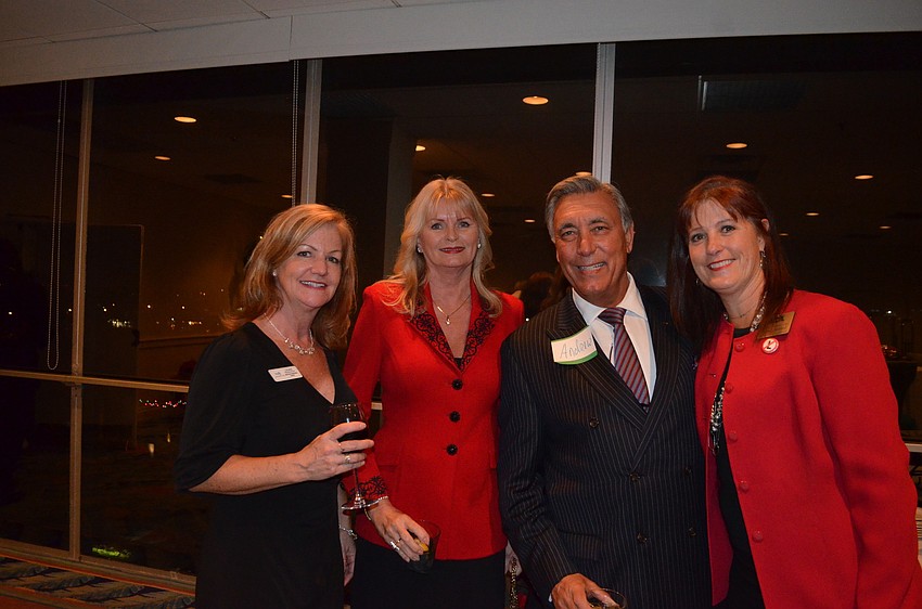 Ramona Glanz, of National Awards, Andrew Vac, of RE/MAX, and Tammy Halsted, of RVA