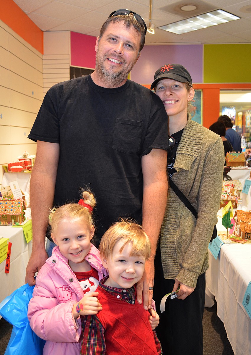 Ted and A.J. Riedeburg with their children Emilie and Nathan.