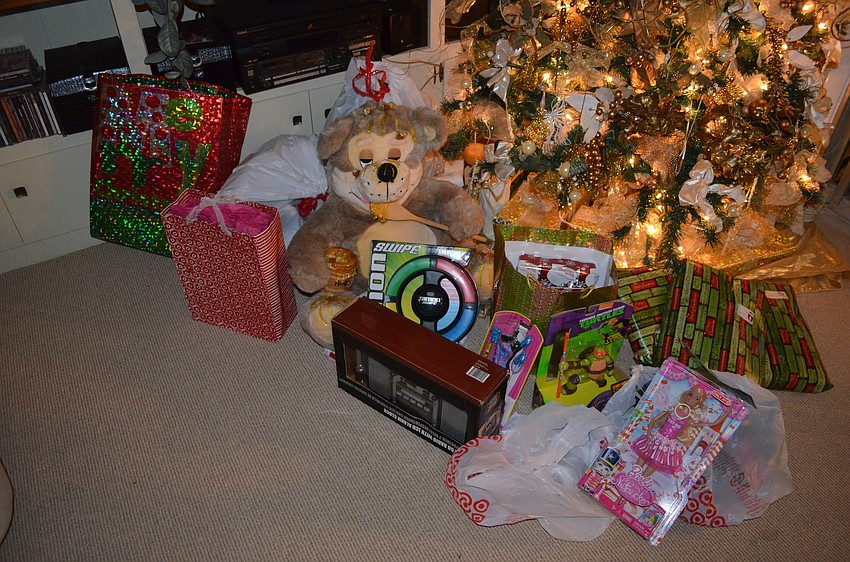 Rotary Club members brought toys to be given to the six children of Amber Avalos, who was murdered in Bradenton on Dec. 4.