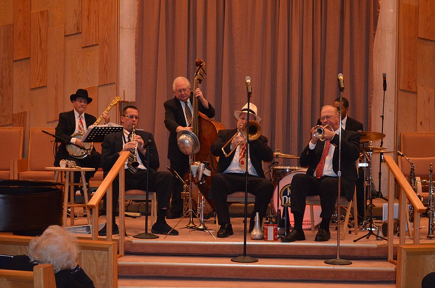 The band performed well-known songs from various decades.