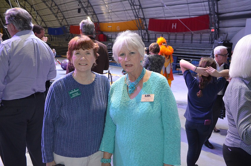 Nancy Taussig, of Barefoot Weddings, and Peg Pluto, of Tommy Bahama