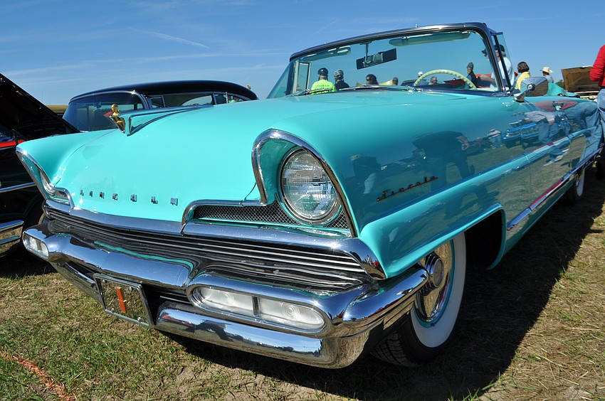 Waterlefe homeowner Howie Drourr shows of his 1956 Lincoln Premiere convertible.