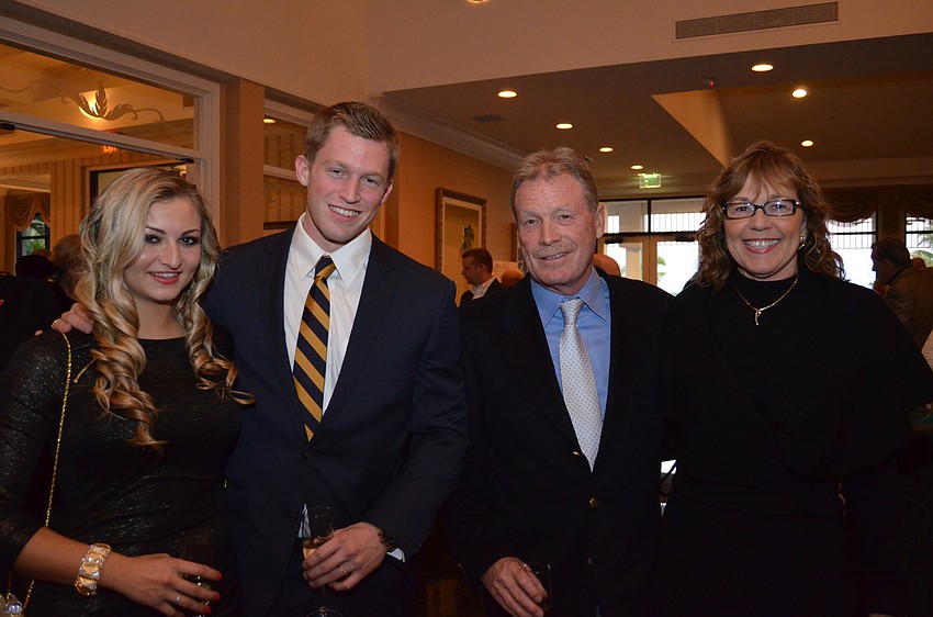 Katrina and Devlin Michel with his parents Tom and Twink Michel.