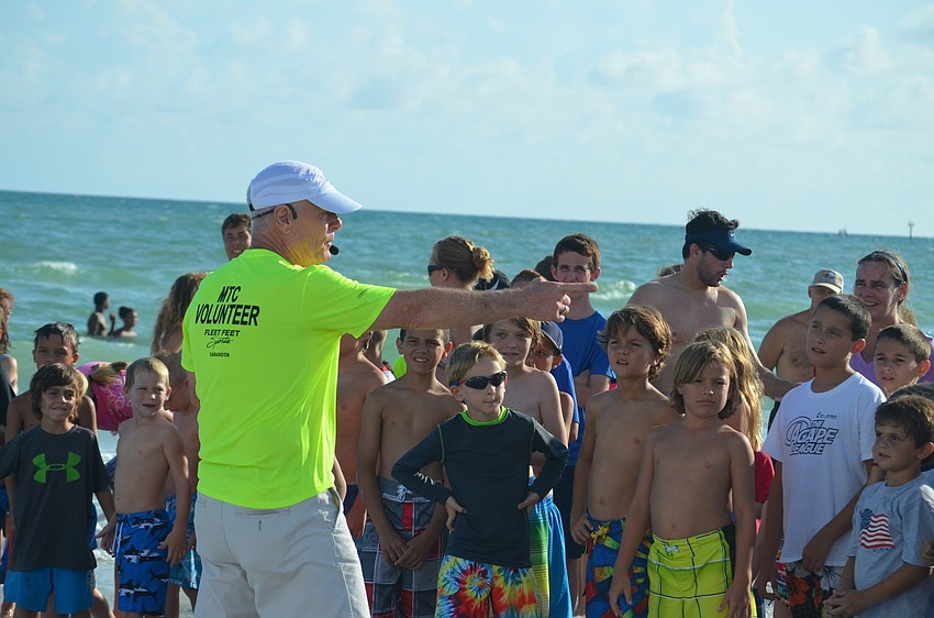 Dan Poloac welcomes runners.