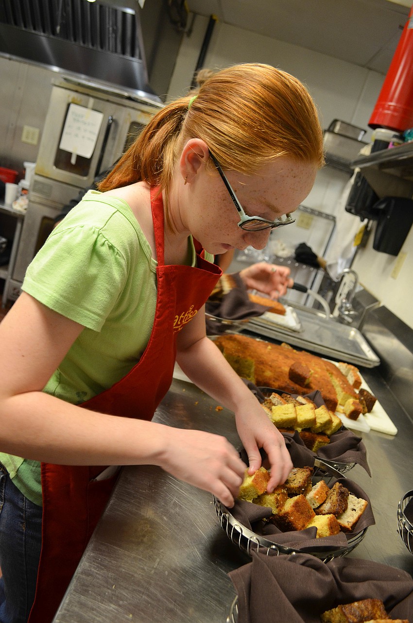 Samantha Schanely prepares bread baskets