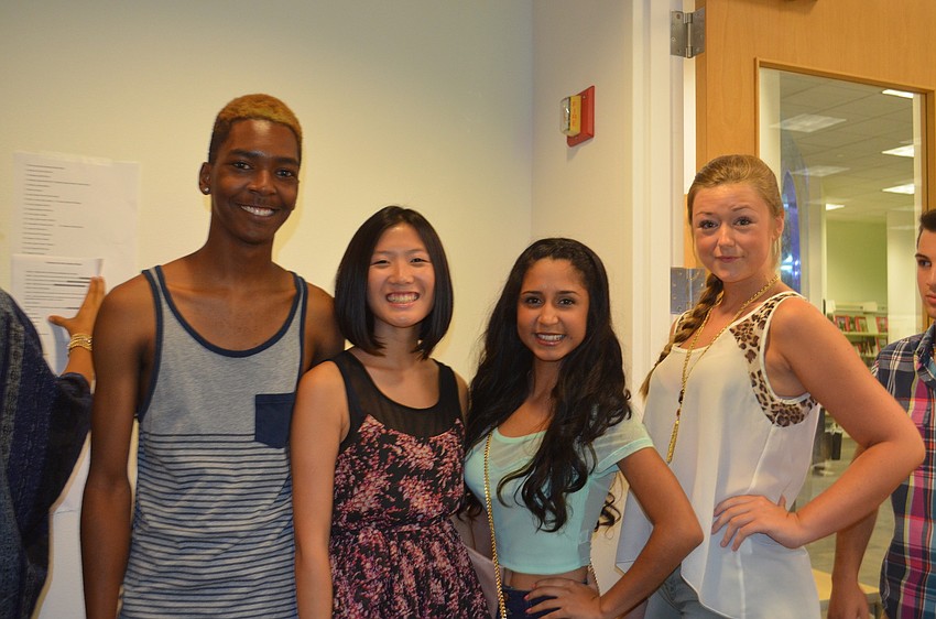 Models Sheldon McCloud, Christine Chern, Jaelhyn Martinez and Laura Osbourne backstage.