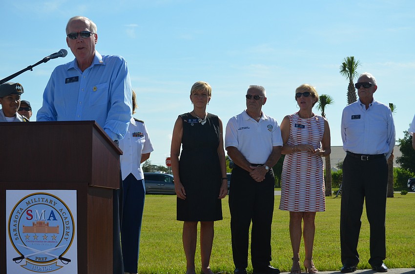Herb Jones, vice chairman of SMA Board of Directors, welcomes families to the new campus.