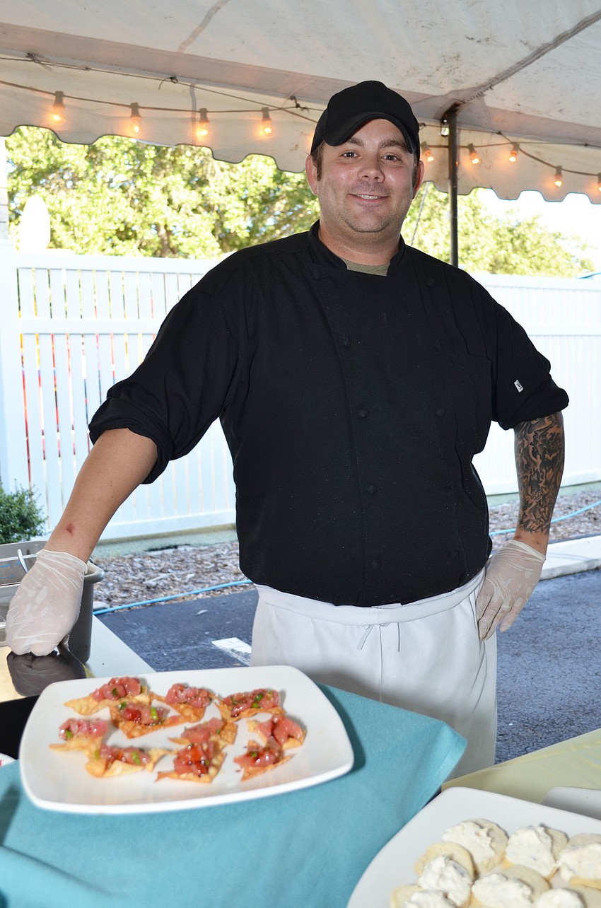 Executive Chef at Duvals, Nils Tarantik, serves up citrus smoked fish mouse and ahi tuna tartar with sweet soy glaze and wasabi vinaigrette.