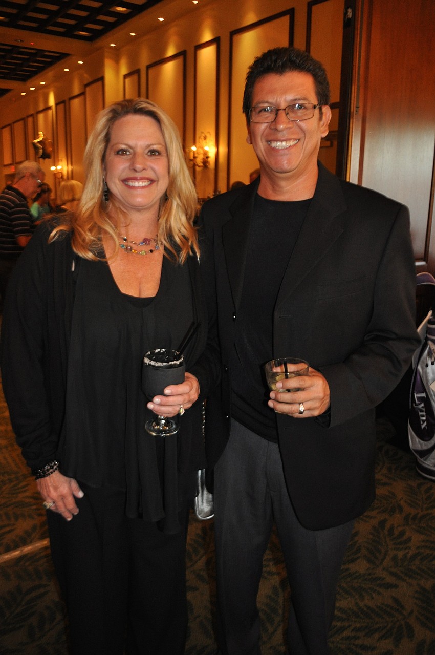 Kim Kent attends with her husband, Ricardo Gonzalez.