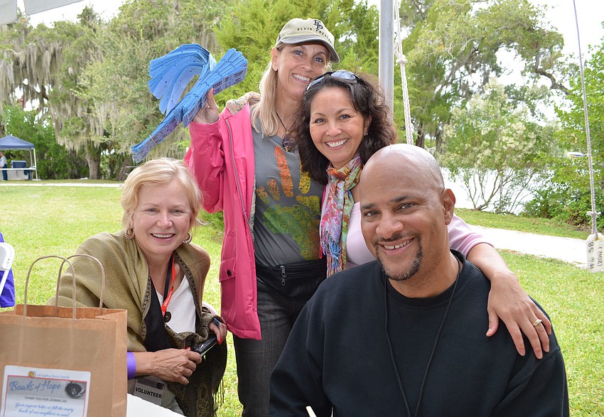 Kris Guillou, Emy Stein, Donnarose Melvin and Eddie Rose enjoy some soup after volunteering for the Bowls of Hope event.
