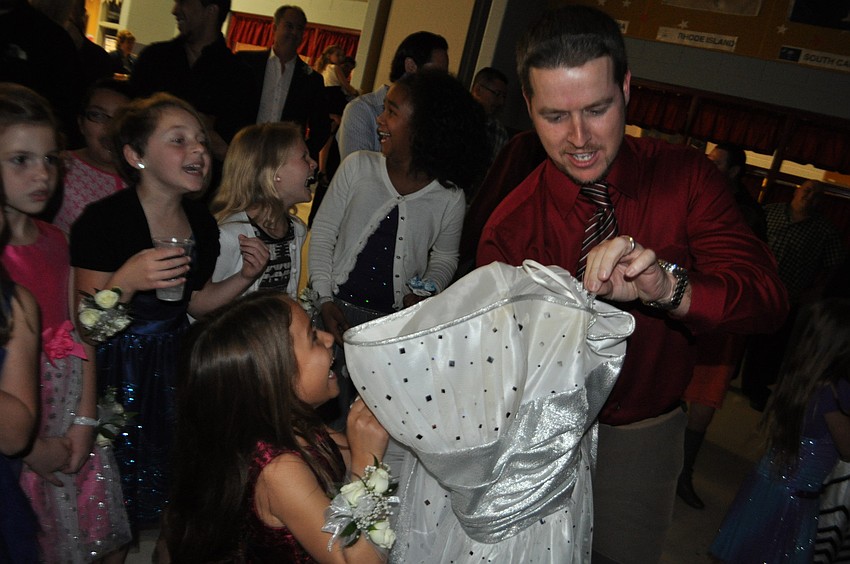 Owen Galvin brings his daughters, Erin, left, and Kaitlyn, right.