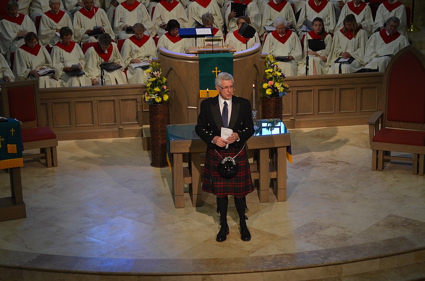 The Rev. Norman Pritchard speaks to the congregation.