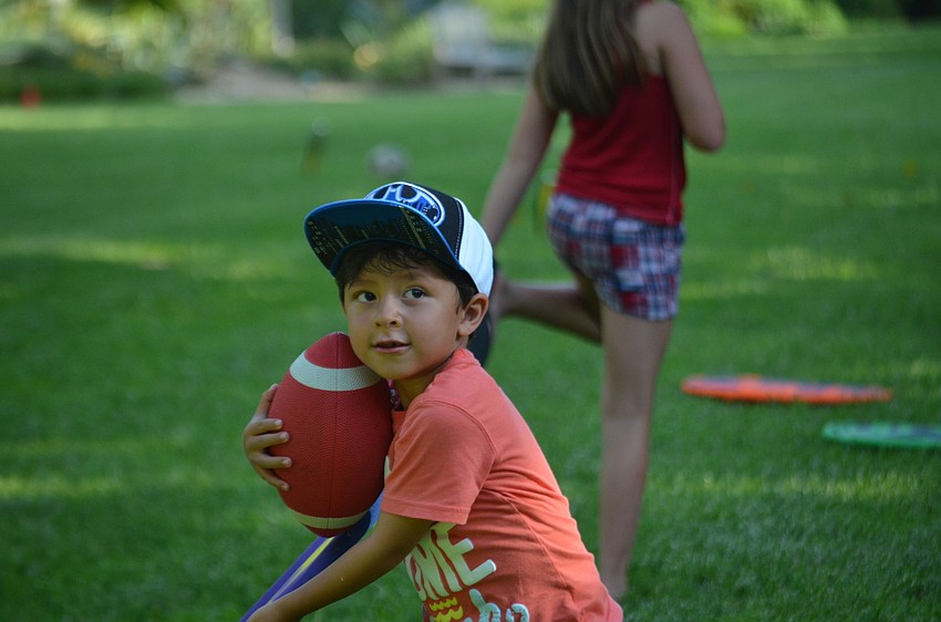 Nicholas Still prepares to throw a frisbee.