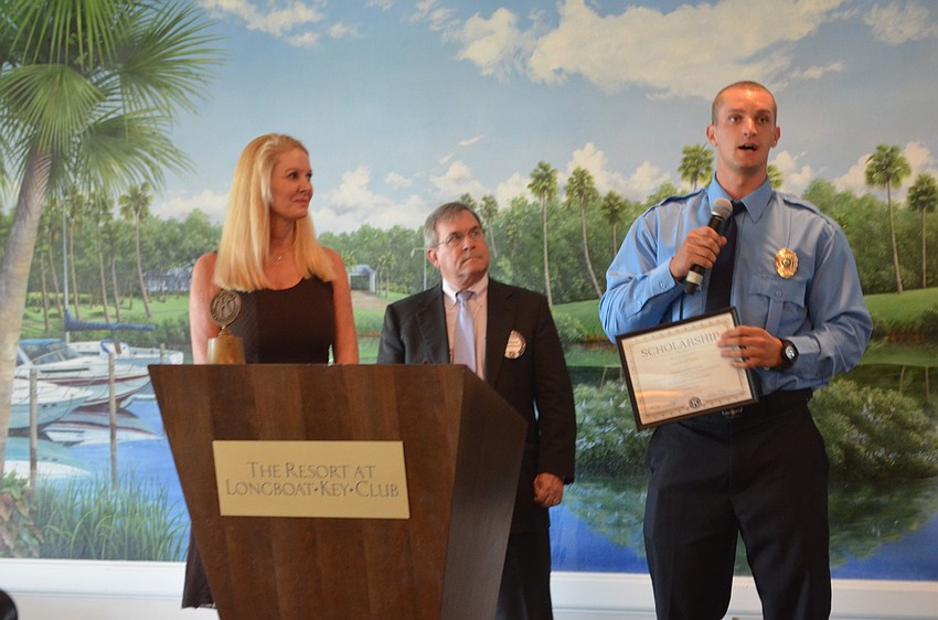 Savannah McGeeUniversity of Central Florida, is awarded an academic scholarship by Scholarship Committee Chair Susan Philips and Longboat Kiwanis Club President Richard Crawford.