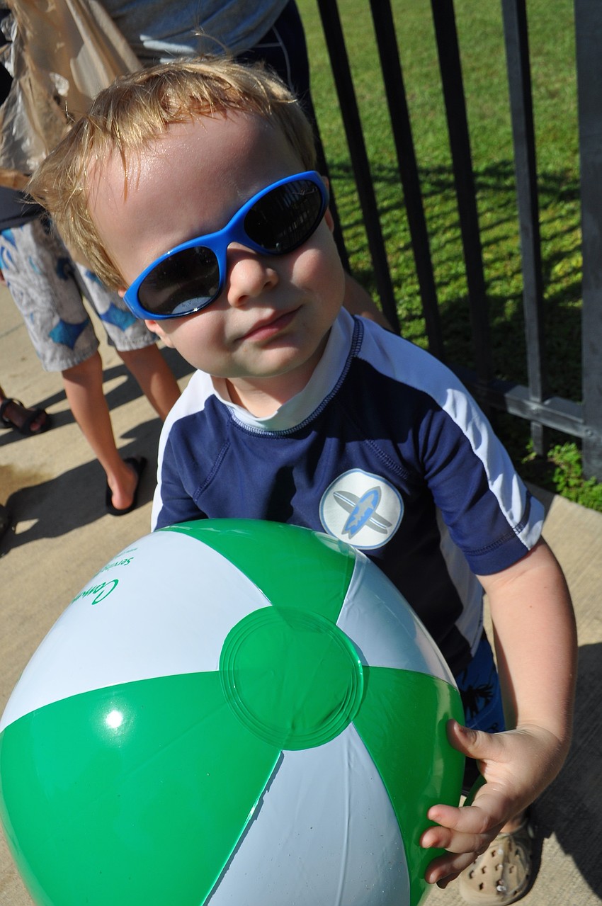 Oliver Barr, 2, came out with his mom, Gene Witt Elementary teacher Kellie Bates.
