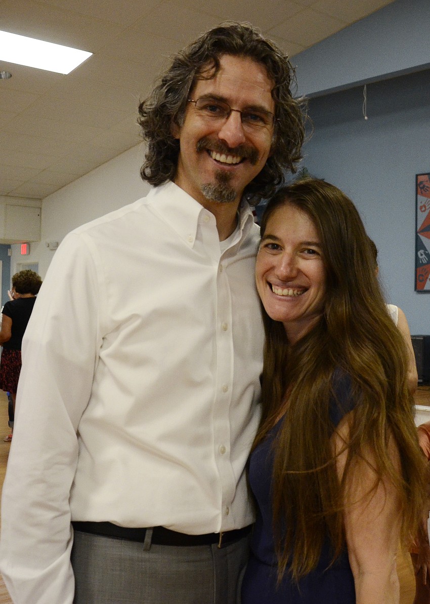 Temple Emanu-El's rabbis, Brenner and Elaine Glickman, met with parents and children during the temple's religious school orientation event Sunday.