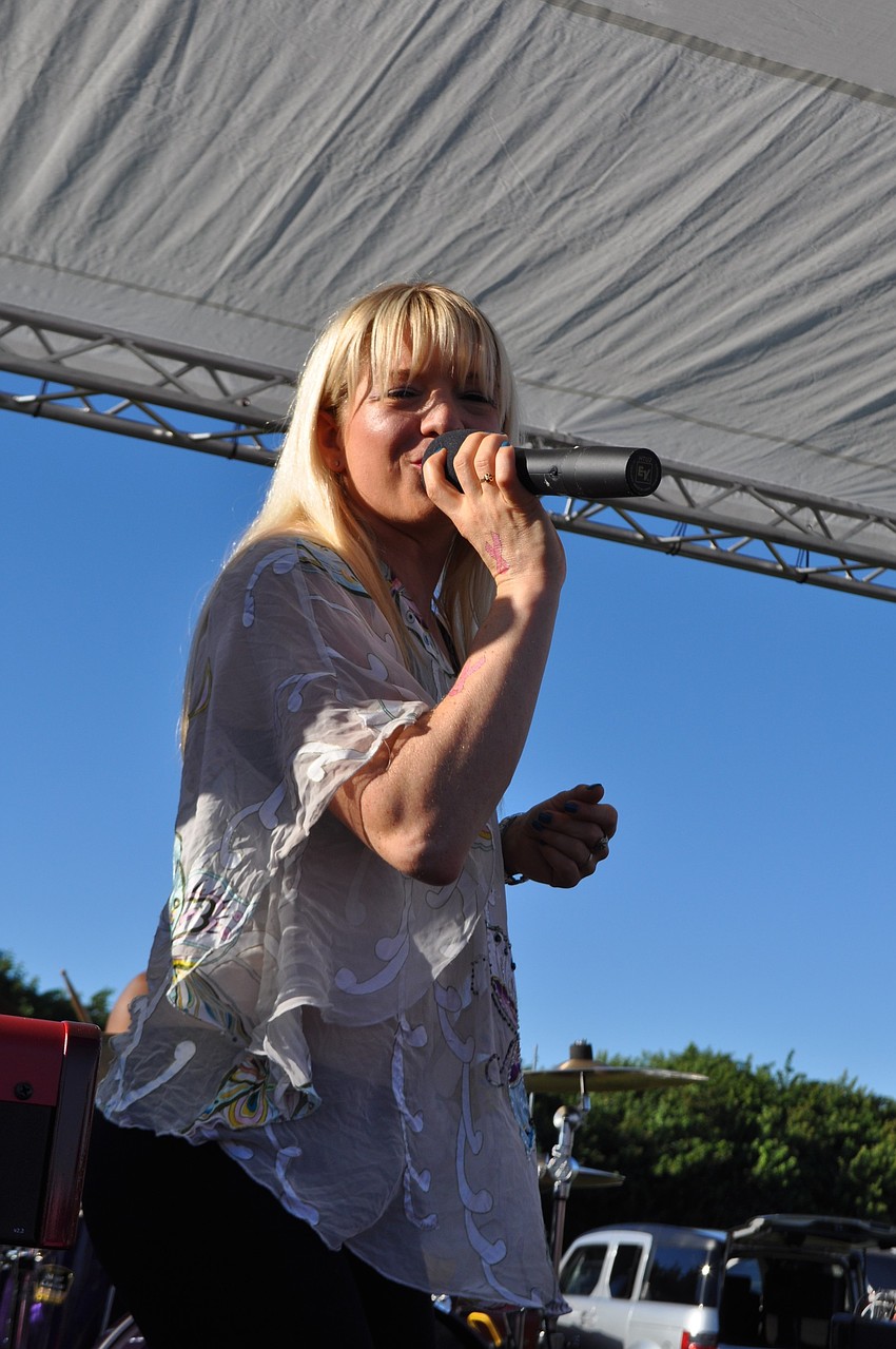 The Kara Nally Band provides live music as walkers begin their 3.1-mile trek.