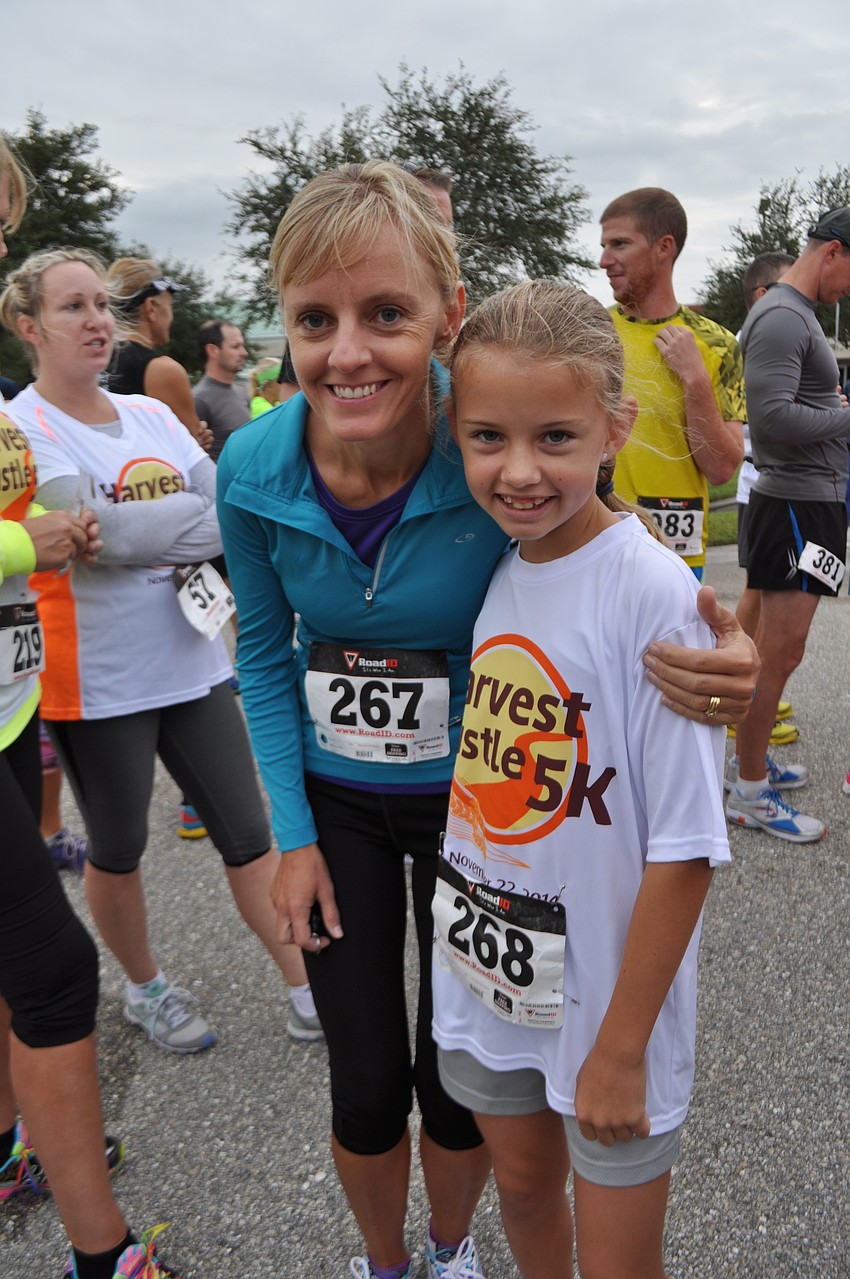 Lisa Leatt runs with her daughter, Tamlyn, who turns 10 on Thanksgiving Day.
