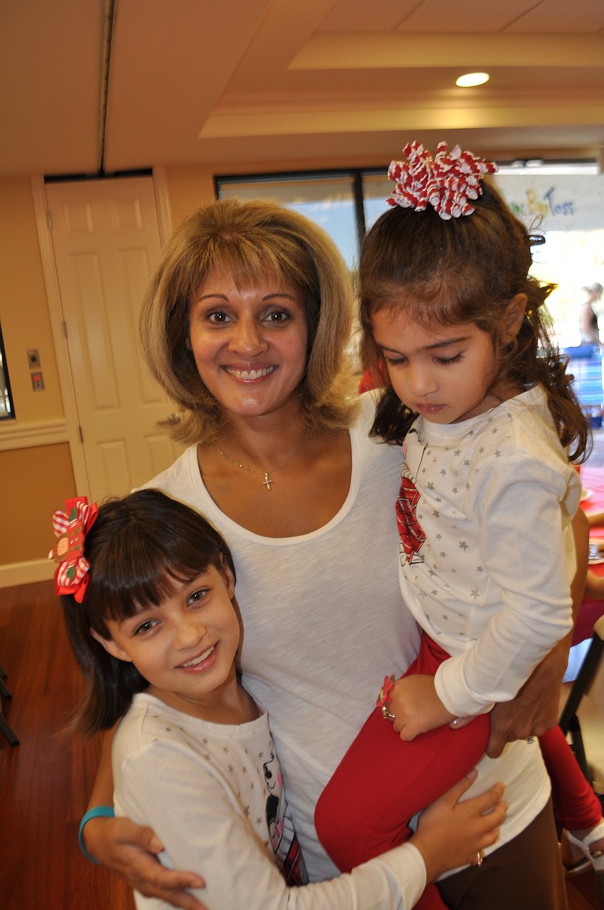 Nadia Wood attends with her daughters, Hannah and Haven.