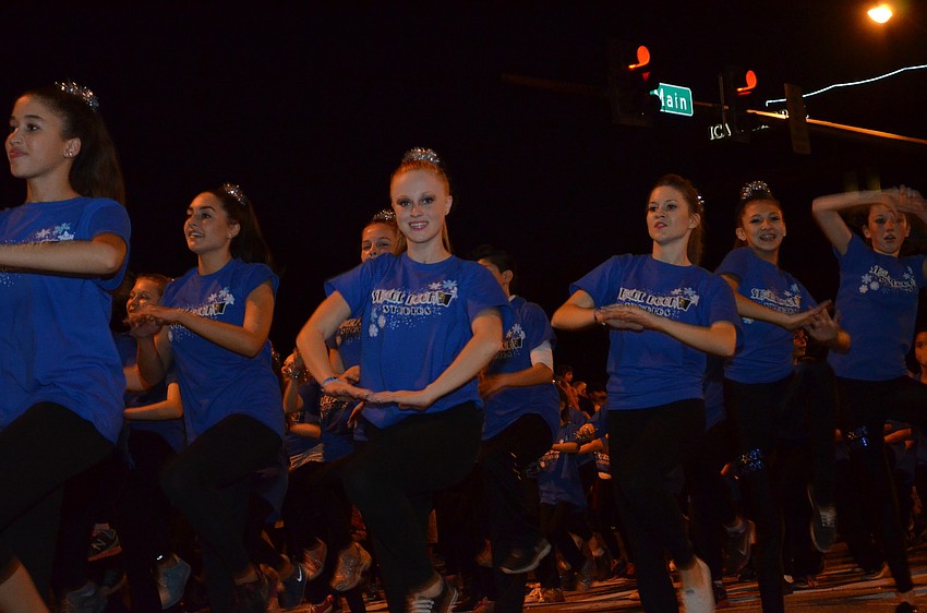 Stage Door Studio performers dance during the holiday parade.