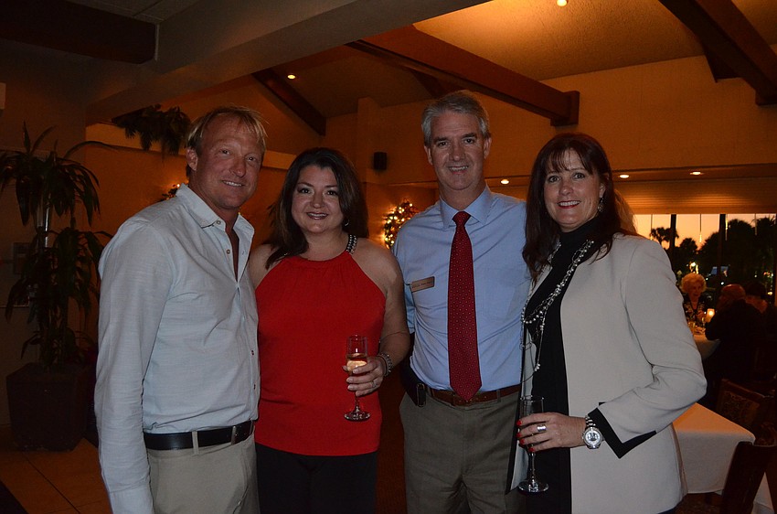 Eric Seace, former president of the association, Paulette Callender, of the Spice and Tea Exchange, James Masien, of Comcast Spotlight, and Tammy Halsted, of RVA