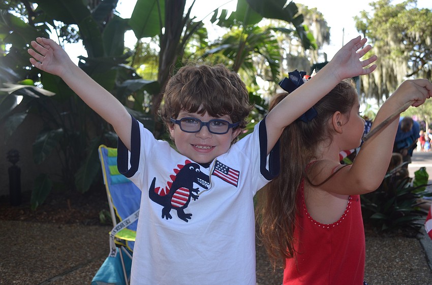 Trey Cole greets guests as they wait in line.
