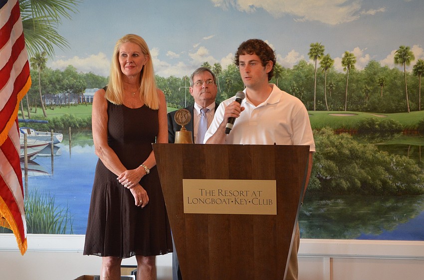Justin Weaver, Sarasota County Technical Institute, is awarded a technical scholarship by Scholarship Committee Chair Susan Philips and Longboat Kiwanis Club President Richard Crawford.