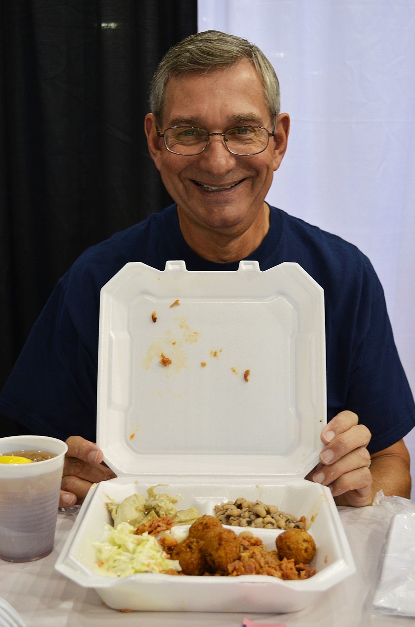 The meal served included pulled pork, black-eyed peas, hush puppies and swamp cabbage.