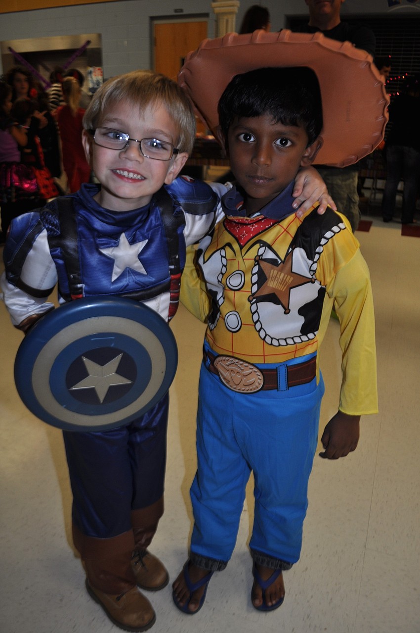 Owen Galvin and Chaitanya Kurakula proudly wear their costumes.