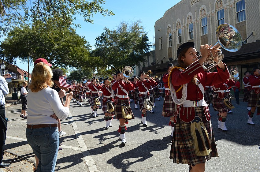 The Riverview High School Kiltie Band performs during the Veterans Day Parade.